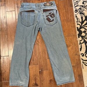 Stylish COOGI Blue Jeans with Unique Back Pocket Design